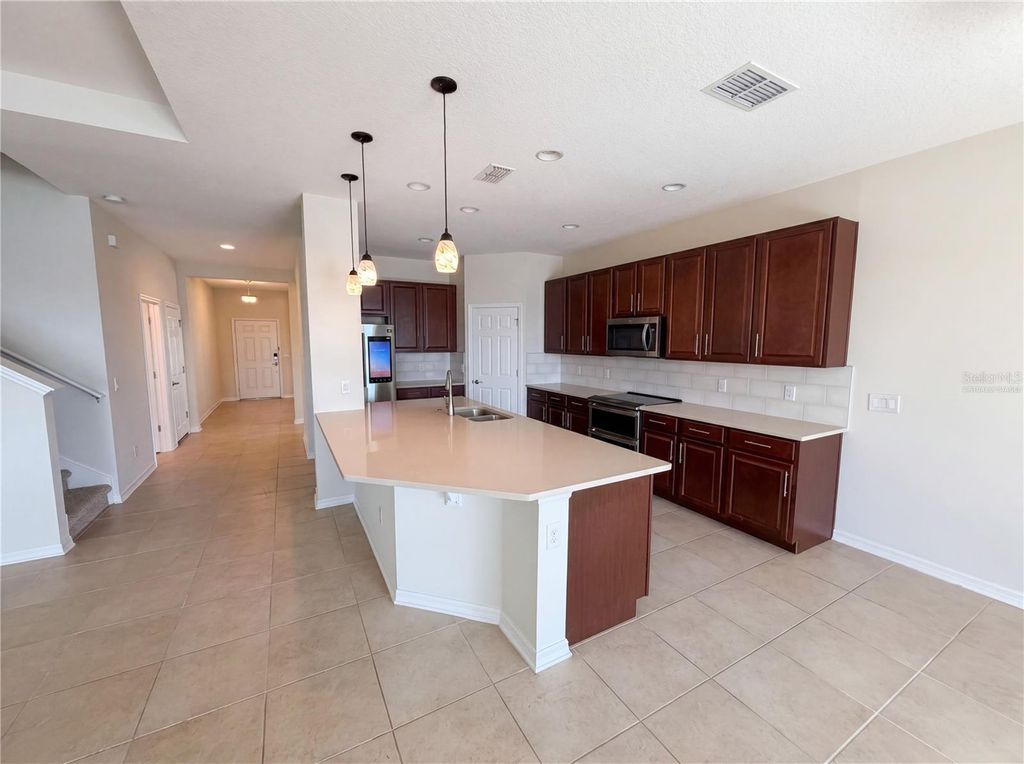 Photo of 1811 Henley Street, Magnolia Square, FL 34771 (MLS # O6406715)