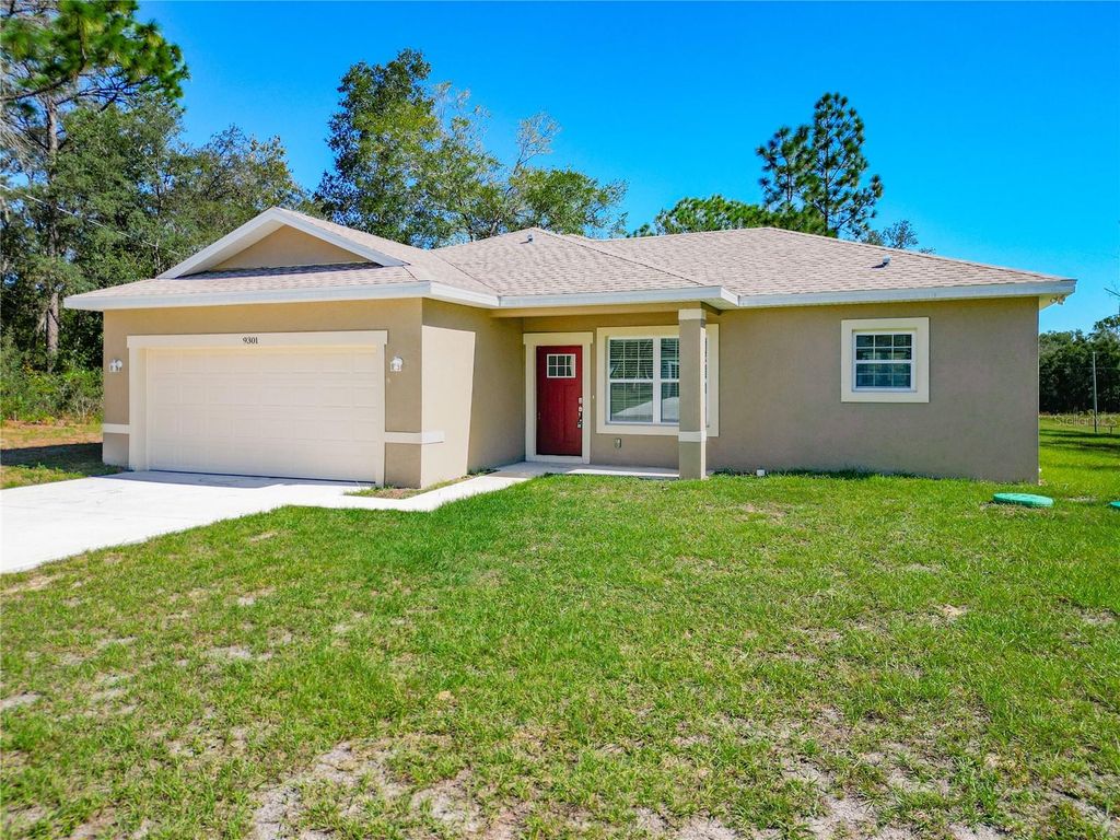 Photo of 9301 N Akola Way, Citrus Springs, FL 34434 (MLS # O6333750)