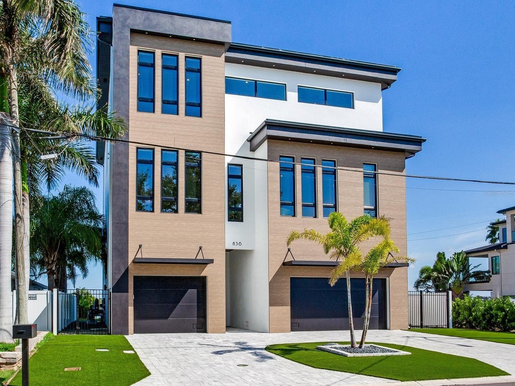 Photo of 836 Bay Point Drive, Madeira Beach, FL 33708 (MLS # TB8546068)