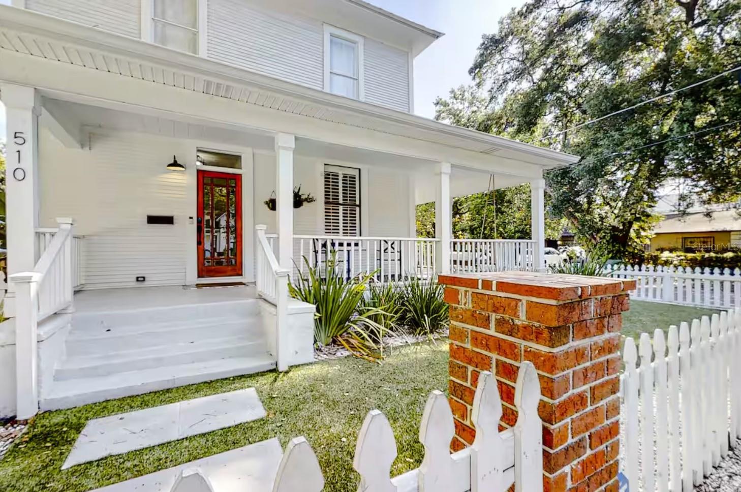 This stunning and historic two-story pool home sits on a spacious corner lot in Tampa Heights, one of the oldest and most beautiful neighborhoods in the city. It's also incredibly convenient, within a few blocks of numerous restaurants and attractions. You will have easy access to downtown, the Tampa Riverwalk, Armature Works, the Florida Aquarium, Ybor City, Seminole Heights and world-class dining and shopping within a two-mile radius. The house dates back to 1902, its charm immediately evident in the gorgeous exterior and outdoor living spaces. Say hi to the neighbors while drinking your morning coffee on the large wrap around front porch complete with porch swing. Later, splash in the stunning, resort style heated pool complete with water feature and a sun shelf, and finally gather for a game of Corn hole or sunset barbecues in the backyard - complete with plush seating. The interior maintains much of its original character, enhanced by crown molding, new beams and granite finishes. Enter into your beautiful formal foyer with its own powder room. Make your way into the spacious living room which opens into the dining room that flows beautifully into the upgraded kitchen with all-new wood cabinetry, a walk-in pantry, and a large island for prepping and dining. In the evenings, retreat to the main-floor bedroom master with en suite with a TV and a desk workspace. Upstairs you will find a second master and two additional spacious bedrooms along with the second shared bath complete with large double vanity and tub. Pool service, pest control, yard maintenance and water softener servicing all included in the monthly rental. All furniture shown included in the rental fee.
The current tenant is able to move out prior to the lease end date if new tenant needs an earlier move in date than November 6.
Strict No smoking policy. Minimum 1 year lease. Pets will be approved on a case by case basis and will incur an additional monthly pet rental fee. Tenant responsible for the following: Change all AC Filters every 3 months (filters at cost to renter, sizes provided) Provide access to home for pool/yard servicing, HVAC Preventative Maintenance, Quarterly Pest Maintenance, Water Softener/ Filter Maintenance.