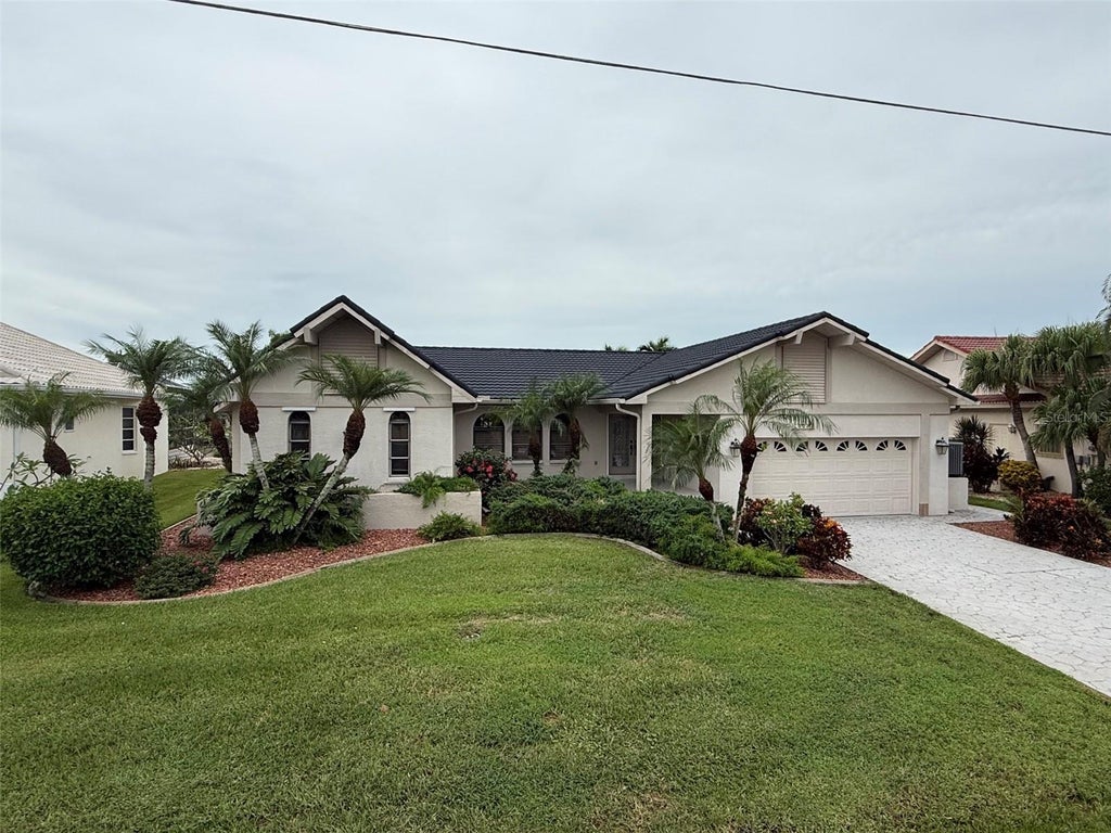 Photo of 523 Toulouse Drive, Punta Gorda, FL 33950 (MLS # C7531581)