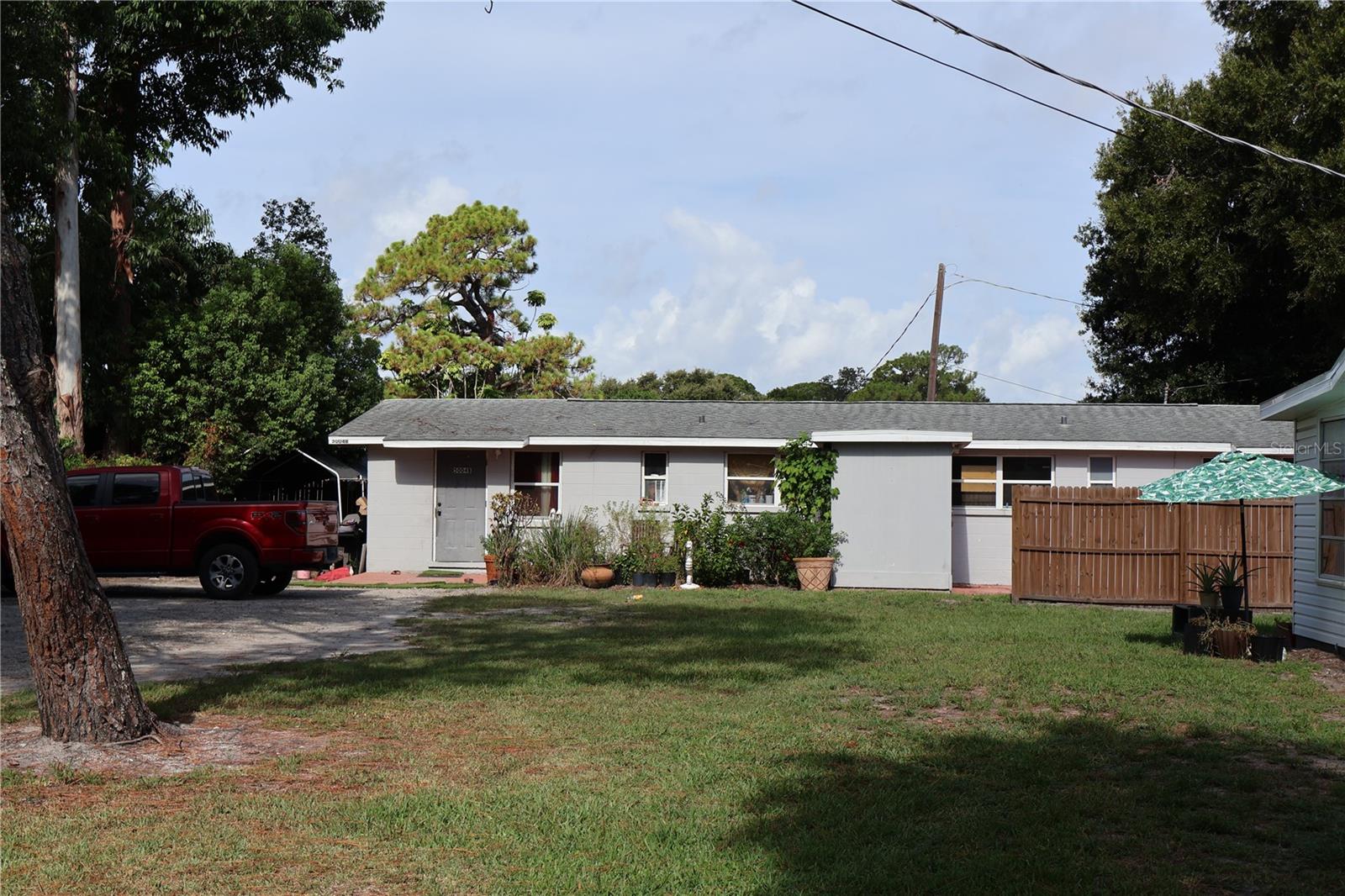 Under contract-accepting backup offers. Duplex with 2 bedroom 1 bath per side. One half renting for $1250 and the other being rehabbed. This listing being sole together with the single family home at the same location and address (each priced at 300k). Newer roof, laundry rooms for both sides, long term tenants in month-to-month terms.