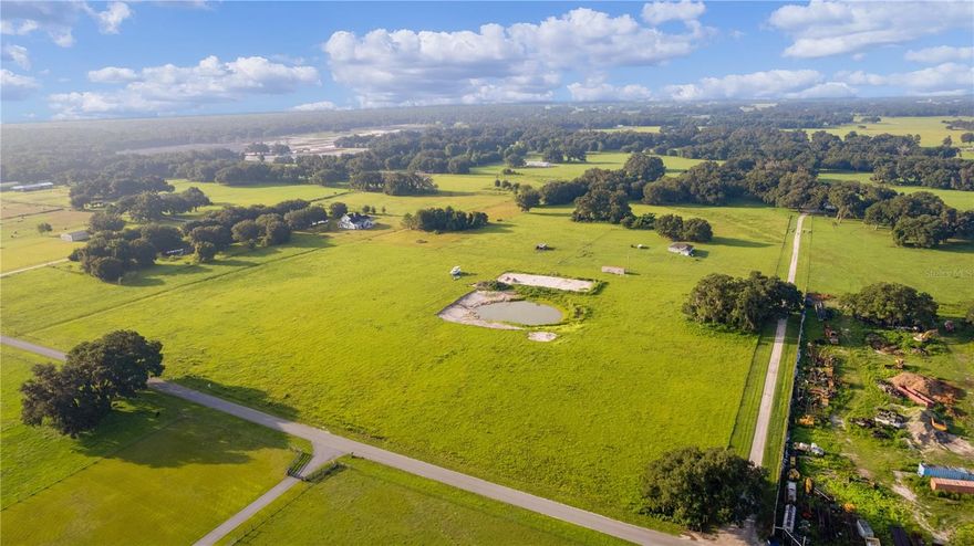 PRICE REDUCTION! - What an incredible opportunity to purchase 9.45 acres of pristine vacant land just 10-15 minutes from Middleton where the new VILLAGES CHARTER SCHOOL is located. This charming property with flat land and good soil offers you the opportunity to build your dream home on an agriculture zoned property where you can raise your own animals. A 52’ x 62’ area of land has been site prepped to build your custom dream home. A new well is in place with a 2 horse power pump and 2” pipe as well as the electric with the meter already hooked up. Also, a 10’ x 40’ metal building/shed has been erected on concrete footers. The property is a corner lot and CR 546A is a paved road. There is a fence on 3 sides of the property and a small pond approximately 120’ x 120’ on the property as well. Convenience is at your doorstep, as the property is just a short 15-minute drive to I-75, allowing for easy access to neighboring cities and attractions. For those seeking the comforts of a town, you'll find yourself a meager 10 minutes away from the heart of Bushnell, a pleasantly old-fashioned community with all the essentials you need. Additionally, the appeal of coastal living is within your reach, as you're only approximately 60 minutes from the pristine Gulf Coast or Disney World where great adventure awaits you! If you are excited about building your dream home, and uou don’t want to waste any time, the owner has an Engineered Design Building Plan that is available for purchase. Make your plans now to visit this property today. The seller is motivated to sell!