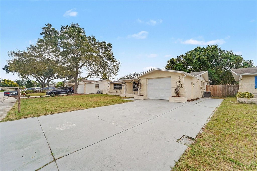 Photo of 5310 Bob White Drive, Holiday, FL 34690 (MLS # O6447698)
