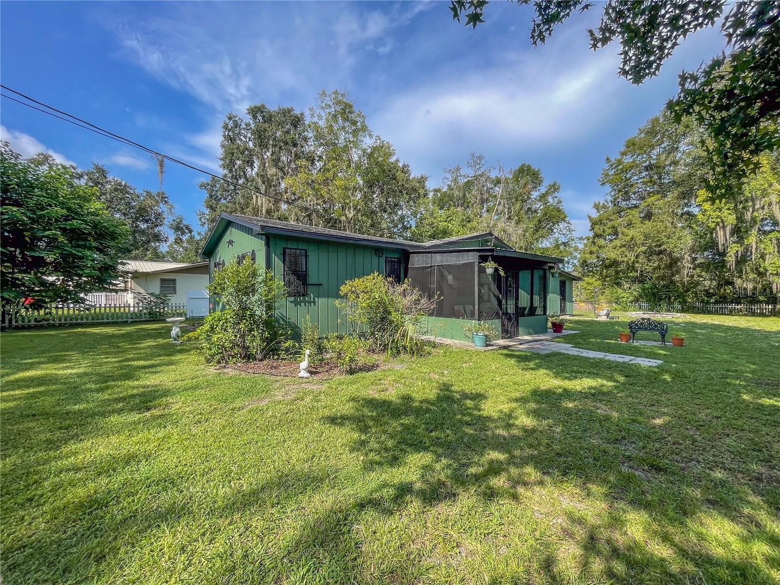Welcome to Withlapopka Islands! Picturesque 2 Bed 1 Bath Waterfront Paradise leading to Withlacoochee River and Inverness Chain of Lakes! Sitting on this 0.43 Acre Lot you'll find peace on the canal with your Boat Dock and Boat Slip on the property as well as Community Boat Ramps to launch so you'll be setting sail in no time to experience a classic aquatic adventure! Take a moment to relax with a cup of coffee in the Screen Enclosed Front Porch or by the water on the Expansive Wood Deck. The Home includes a variety of features such as a Bonus Room with its own access door. There are many more star quality features such as 2023 AC, 2023 Septic Pump, 2023 Water Heater, Wood Cabinets and Corien Countertops, all within the Freshly Painted Interior/Exterior! Also included is a 2-Car Carport with Attached Shed and 3 additional Sheds on the lot for plenty of storage space! Located off E Gobbler Dr by S Florida Ave for easy access through Citrus County or travel thru FL-44 E leading to the Florida Turnpike for trips to Orlando, Tampa or Miami. Your Dream Is HERE!