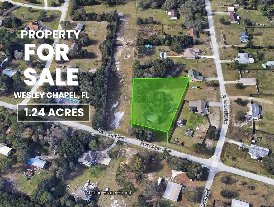This exceptional 1.24-acre parcel at 4001 Fox Ridge Blvd, Wesley Chapel, FL 33543, offers the perfect opportunity to build your dream residence in the highly desirable A R Agricultural Residential District. This zoning allows a single-family home, Barndominium, Mobile home, or Modular home, ideal for those seeking a rural, estate-style living environment while still being close to modern conveniences. The property previously had a mobile home, and a well and septic are already in place (buyer to verify), providing valuable savings for future development. Located in a No Flood Zone, with No HOA and No CDD, you will enjoy full use of the land without restrictions. Wesley Chapel continues to be one of Florida's fastest growing areas, known for top-rated schools, major shopping centers, hospitals, restaurants, Epperson Lagoon, and easy access to I-75, SR 54, and SR 56, offering both lifestyle and long-term value. A qualified buyer can purchase this land with as little as 20% Down, making this an exceptional opportunity in a booming location.