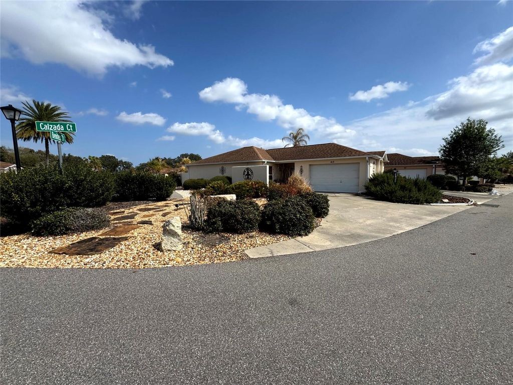 Photo of 413 Calzada Court, Lady Lake, FL 32159 (MLS # O6386064)