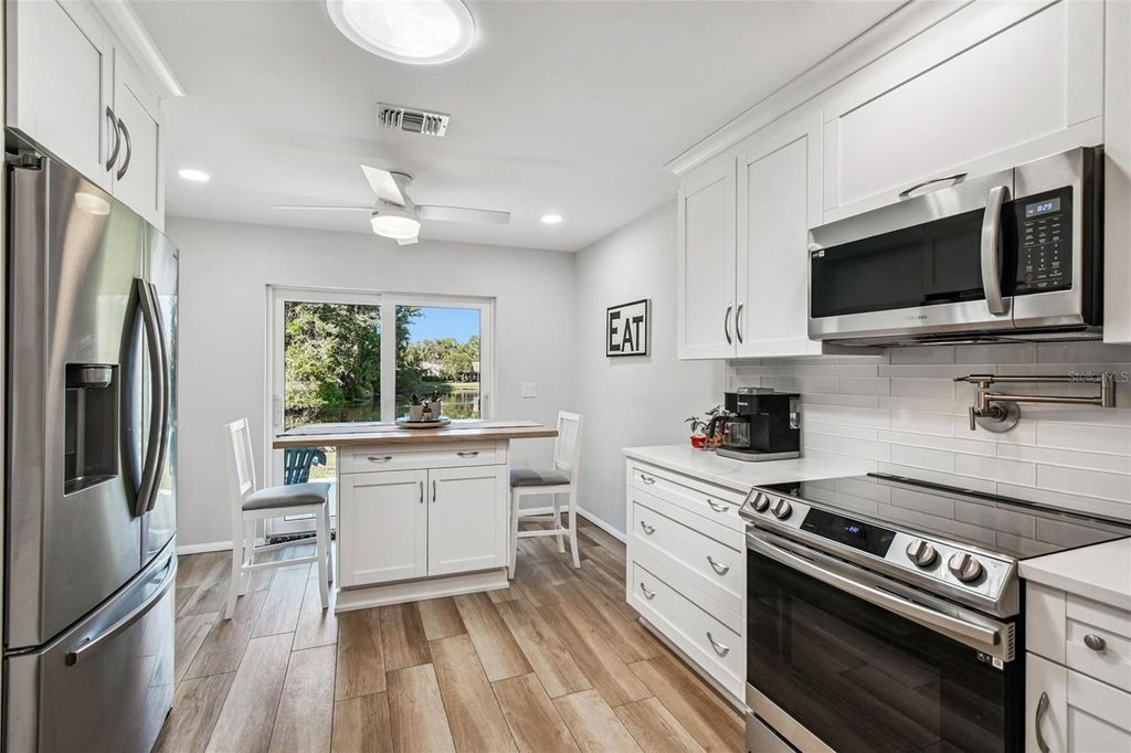 Photo of 11539 Scotch Pine Drive, New Port Richey, FL 34654 (MLS # TB8448229)