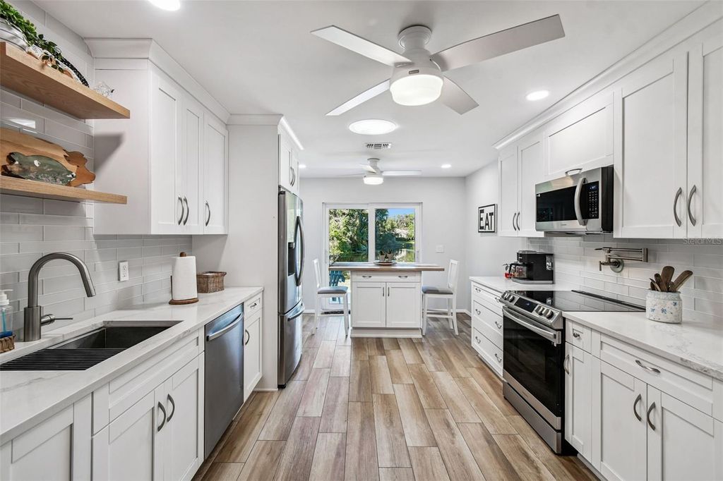 Photo of 11539 Scotch Pine Drive, New Port Richey, FL 34654 (MLS # TB8448229)