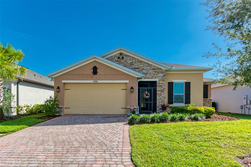 Enjoy this stunning CABELLA Model with brick/stone front and leaded front glass door in the award winning 55 Plus community of Solivita!  This model has 1705 sf. VIRTUALLY WALK THROUGH this home by watching the attached MATTERPORT 3D TOUR! This model has 2 bedrooms, 2 baths plus study/flex room which exhibits the resort lifestyle YOU HAVE BEEN WAITING FOR! This spectacular view is captivating upon entering the home through the front leaded glass door and especially from the covered and screened lanai. This unique home was initially constructed and designed by the original owner. You'll love the nice flow of this OF THIS BEAUTIFUL HOME. All recessed lighting is of the energy efficient LED quality. The high ceilings have a grand feel. All door hardware is of the lever type. A keypad entry means you will never be locked out. This home has an alarm system. There's plenty of space in the garage for storage for 2 cars and an extra outlet for a GOLF cart, Other nice features of this home are the spacious driveway, lush landscaping, front screened entry, large 14’ X 20’ screened Lanai ample storage and closet space, OPEN CONCEPT main living area, full kitchen with breakfast bar walk in pantry which has A/C and plenty of counter space! Then there is still a nice dining area and large Great Room. The owner's suite feels like a real hideaway with 1 large walk-in closet, water closet, dual sinks, vanity, separate shower, large bedroom area with additional flex space. The additional bedroom is well appointed, spacious and share a bath with tub/shower combination. The laundry room includes a washer and dryer.  The HVAC has a UV filter installed. The thermostat can e controlled by a computer or celphone. There's so much to love about this home. Enjoy the good life in Solivita with use of 14 community pools, 2 huge amenity centers, 2 championship golf courses, 3 restaurants, pharmacy, concierge, full team of lifestyles staff, over 200 social clubs to join, major sports and fitness options such as pickleball, softball, tennis, bocci, shuffleboard and so much more all nestled on over 4200 acres of natural beauty. Just outside the gate are medical centers.
