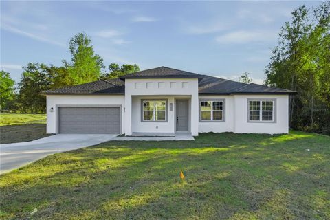 Photo of 13690 SW 43rd Circle, Ocala, FL 34473 (MLS # O6384109)