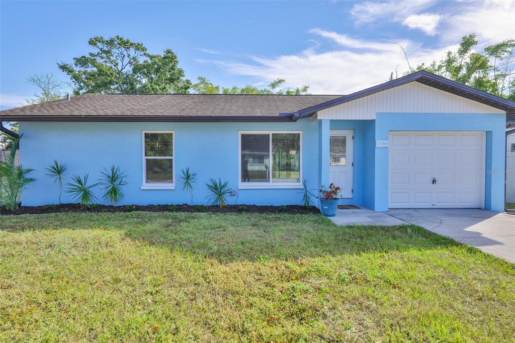 Photo of 13571 Audrey Lane, Largo, FL 33771 (MLS # TB8451754)