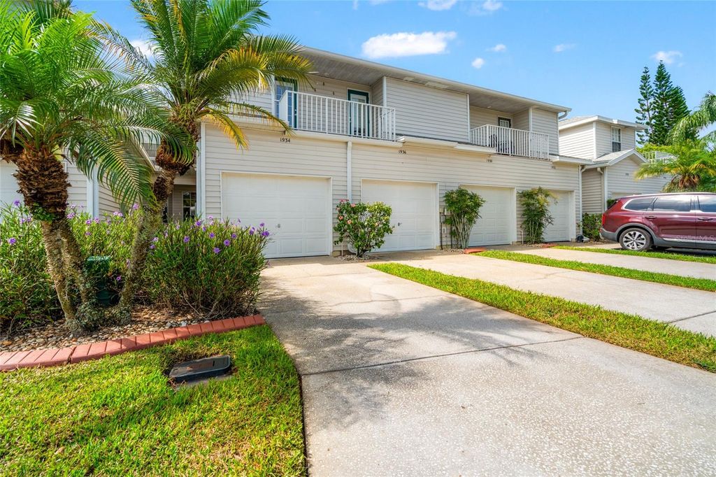 Photo of 1936 Heron Cove Drive #104, Lutz, FL 33549 (MLS # TB8384192)