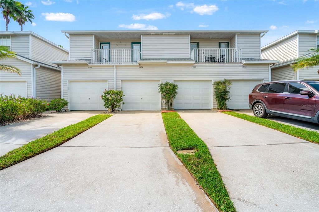 Photo of 1936 Heron Cove Drive #104, Lutz, FL 33549 (MLS # TB8384192)