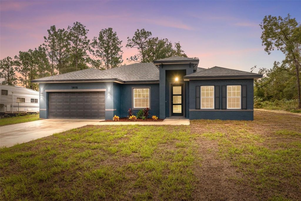 Photo of 5978 SW 154th Lane Road, Ocala, FL 34473 (MLS # O6351155)