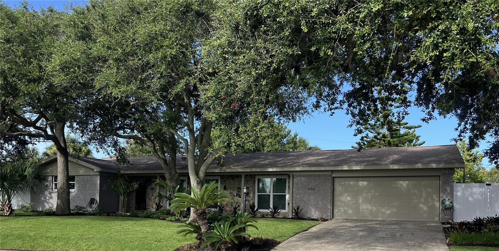 Welcome to 950 Ginger Circle, a beautifully remodeled pool home located in the desirable Ann Rustin Estates community of Ormond Beach. This stunning property offers the perfect blend of modern updates and outdoor luxury.
Enjoy your own custom landscaped private oasis with a newly resurfaced pool, ideal for relaxing or entertaining on warm Florida days. Inside, the home features a spacious kitchen with a large island, granite countertops throughout, and ample cabinetry—perfect for cooking and gatherings. Enjoy family dinners in your separate dining room, and after dinner relax in your living room or large family room. The spacious laundry room provides plenty of storage space to keep your home organized.
The residence boasts a fresh, contemporary design with upgraded fixtures and finishes, ensuring move-in-ready comfort. The outdoor shower adds a unique touch, perfect for rinsing off after a day by the pool.
Located in a friendly neighborhood a few streets from Ormond Beach. You will enjoy being close to parks, top-rated schools, shopping, and dining, this home offers both convenience and luxury. Don't miss the opportunity to make this beautifully updated property your new home.
All information is deemed reliable but not guaranteed.