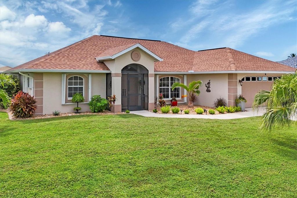 Photo of 92 White Marsh Lane, Rotonda West, FL 33947 (MLS # D6143923)