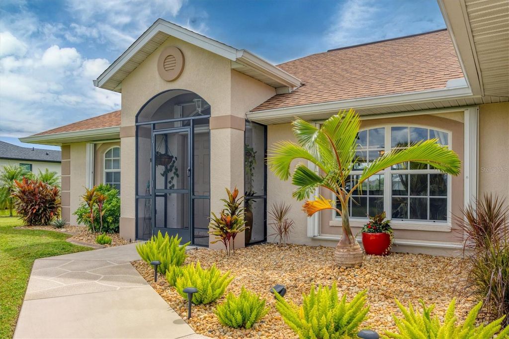 Photo of 92 White Marsh Lane, Rotonda West, FL 33947 (MLS # D6143923)