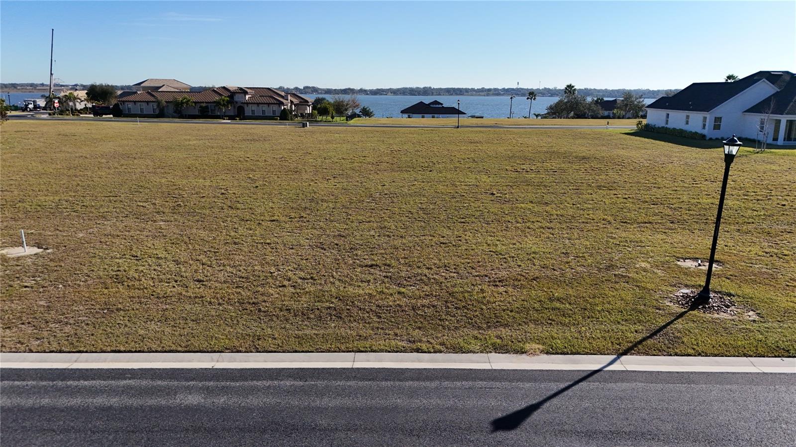 Build your ideal home on this spacious lot in the Water Ridge gated community. Amenities include a clubhouse, three swimming pools, tennis and pickle ball courts, boat ramp, RV and boat storage, and more. Close to shopping and dining, while also providing access to multiple lakes.