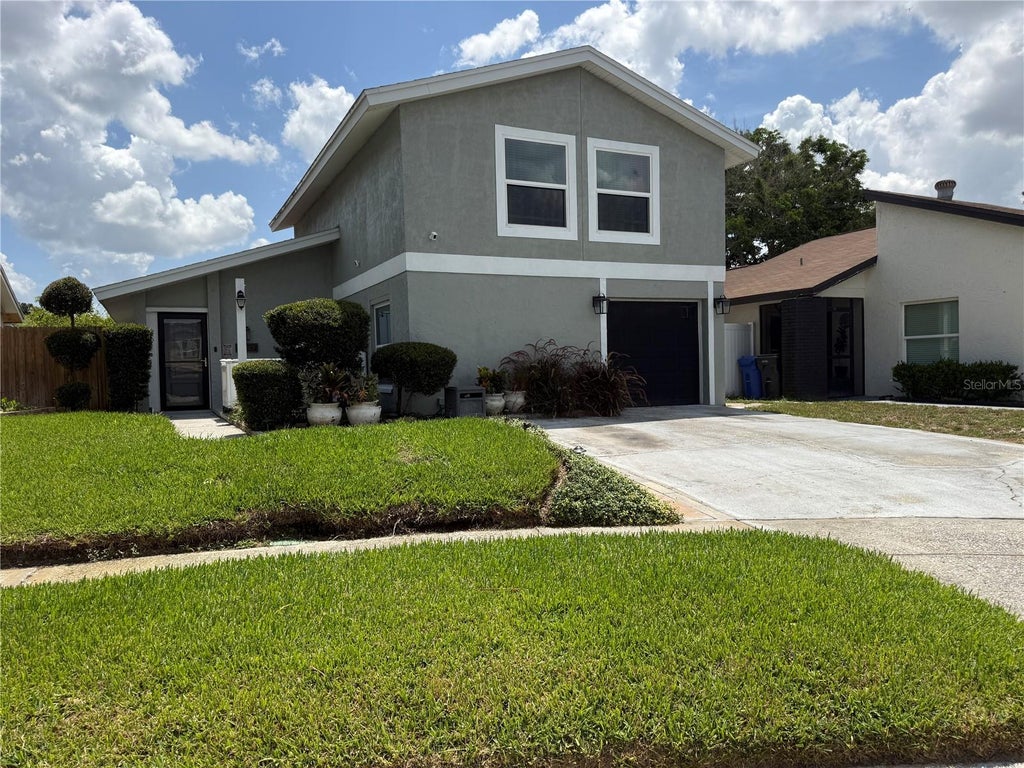 Photo of 10009 Regal Woods Lane, Tampa, FL 33624 (MLS # TB8524472)