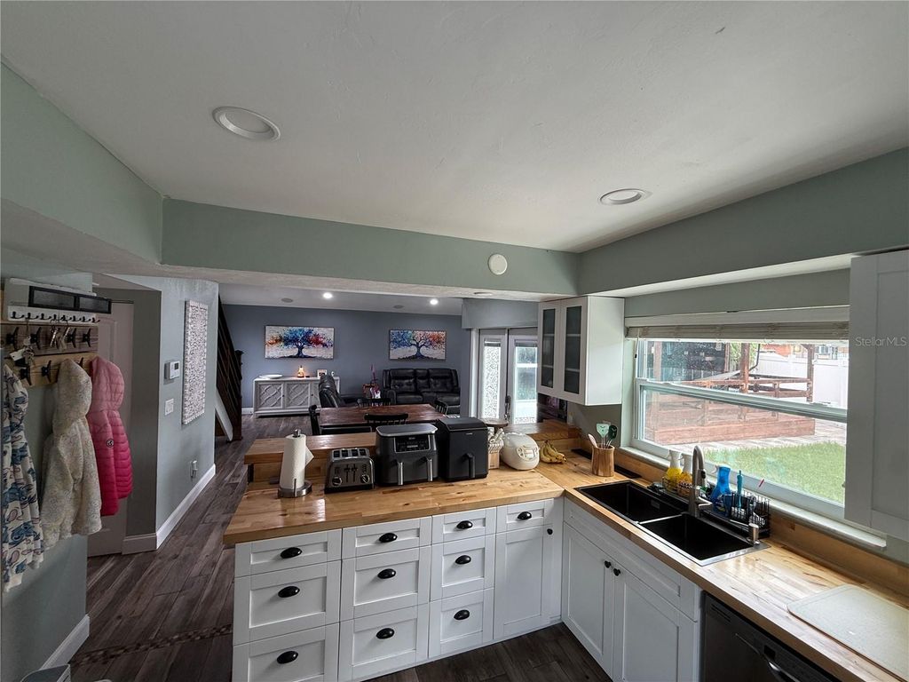 Photo of 10009 Regal Woods Lane, Tampa, FL 33624 (MLS # TB8524472)
