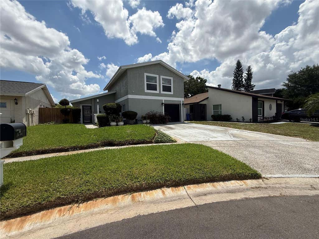 Photo of 10009 Regal Woods Lane, Tampa, FL 33624 (MLS # TB8524472)