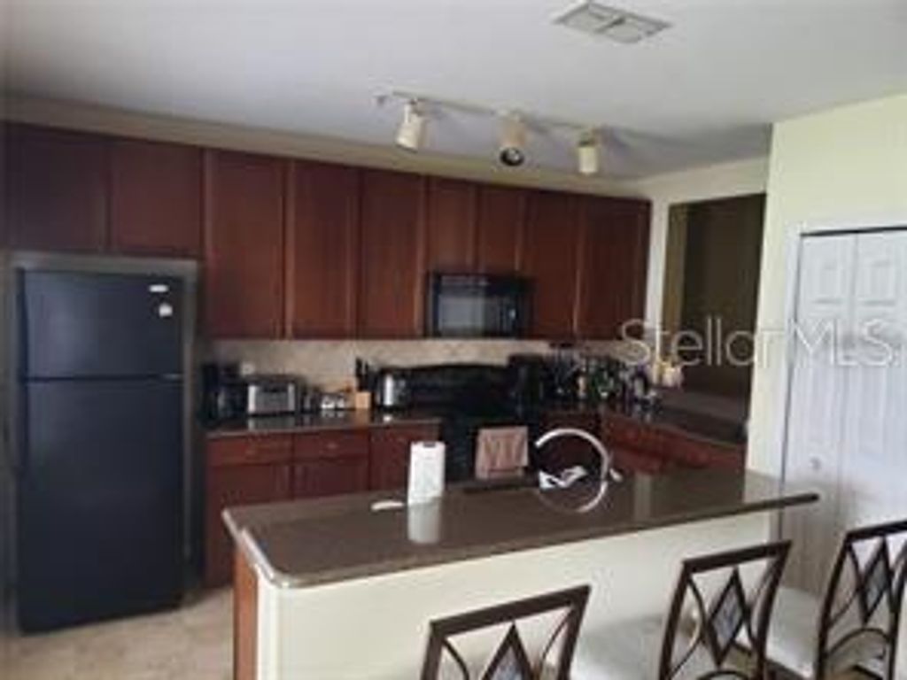 Photo of 2052 Cypress Bay Boulevard #2052, Kissimmee, FL 34743 (MLS # S5145501)
