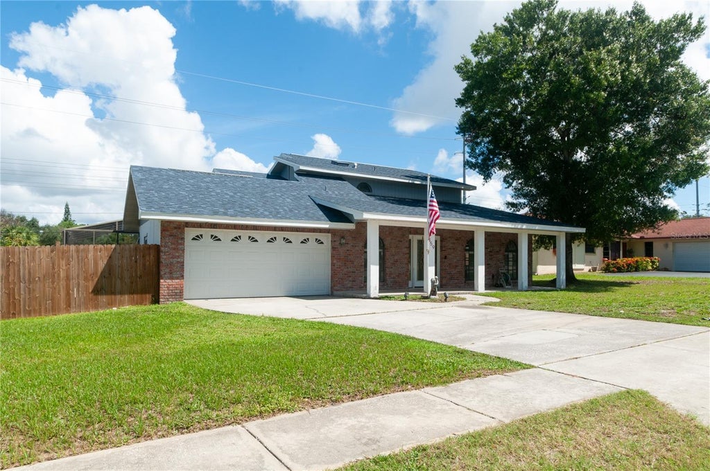 Photo of 859 Pinewood Terrace W, Palm Harbor, FL 34683 (MLS # TB8544679)