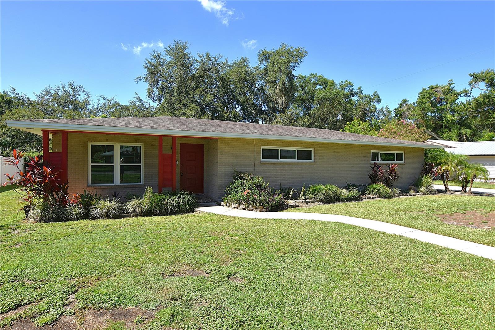 One or more photo(s) has been virtually staged. Check out this updated 3 bedroom 2 bath walking distance to Scott Lake Elementary. This home has been updated with new energy efficient windows. Large .31 acre lot. Extra long drive with plenty of room for parking. Side entry oversized 2 car garage. Tile and laminate floors (no carpeting) Horse shoe shaped kitchen with double sided breakfast bar and stainless steel appliances. Formal living and dining room and family room. Spacious master bedroom with updated master bath with step in shower. Guest bathroom has been updated as well. Large Florida room overlooking oak trees in large backyard. Great neighborhood with NO HOA!