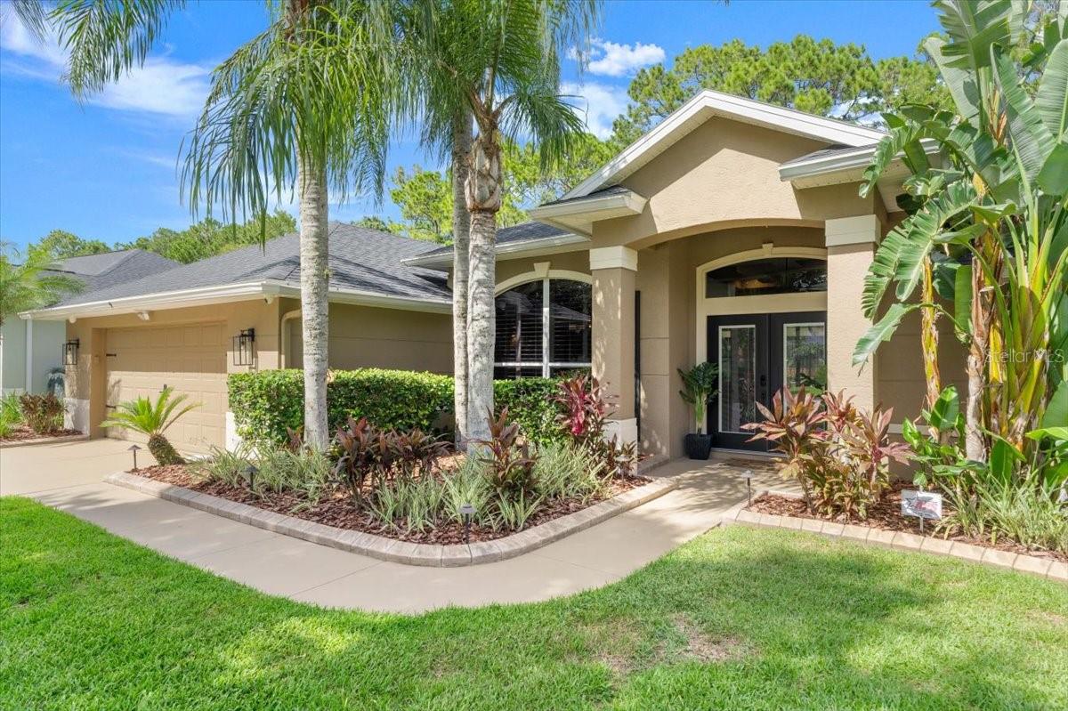 Under contract-accepting backup offers. Welcome to this meticulously upgraded and beautifully maintained ICI built home in the highly desirable gated community of Breakaway Trails - a neighborhood known for its tree-lined streets, custom homes, community clubhouse, pool, pickleball courts, playground, and miles of scenic walking trails.
This 2,839 square foot 3-bedroom, 2-bathroom home with elegant living space and a thoughtfully redesigned outdoor oasis that draws you outdoors. The electric-heated pool with waterfall, sun shelf, LED lighting, and bubblers sits atop a travertine deck and under a spacious lanai, perfect for year-round enjoyment.
The home’s curb appeal is elevated by a widened 24-foot driveway, lush custom landscaping with full curbing, timed solar and landscape lighting, and an 8x10 tool shed tucked behind a custom privacy fence. A new roof (2022) with gutters, fresh exterior paint, and new front entry door with built-in mini blinds make this home truly move-in ready.
Inside, the home features vinyl plank flooring throughout the main living areas and blush-toned carpet in the bedrooms. The living room is a showstopper, boasting a custom accent rock wall and coffered ceiling with bold architectural details. The remodeled kitchen is a chef’s delight with quartz countertops, soft-close cabinetry, and upgraded stainless appliances.
The primary suite is a peaceful retreat with tray ceiling, a walk-in closet, and a fully remodeled spa-like bathroom showcasing premium finishes and unique design elements. The secondary bedrooms share an updated bath with modern finishes, new doors, and door access out to the pool area.
Additional highlights include:
Added Mini split AC in the primary suite (monthly filter service and professionally maintained)
Washer and Dryer
Plantation shutters throughout
Oversized two-car garage with extended depth for extra storage
$25K in artificial turf landscaping for a maintenance-free backyard "entire backyard"
State-of-the-art security system with day/night color view cameras in the front and rear
Whether you're looking for a serene sanctuary or a stylish space to entertain, this home delivers comfort, luxury, and lasting value in one of Ormond Beach’s premier neighborhoods.
Schedule your private tour today and discover the lifestyle waiting for you at 9 Circle Creek Way. ***Furniture available separately.