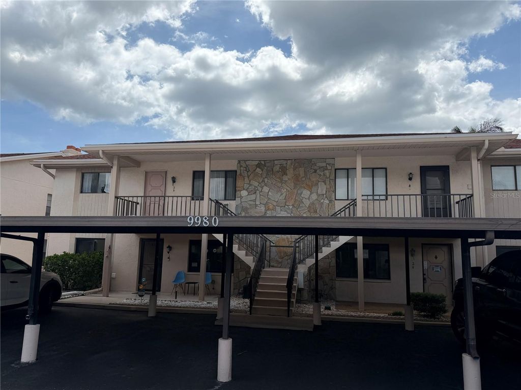 Photo of 9980 Eagles Point Circle #3, Port Richey, FL 34668 (MLS # W7886100)