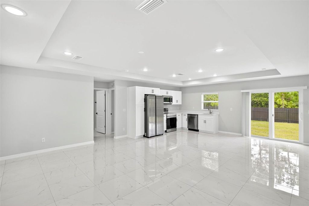 Photo of 708 Lamar Street E, Lehigh Acres, FL 33974 (MLS # O6350748)