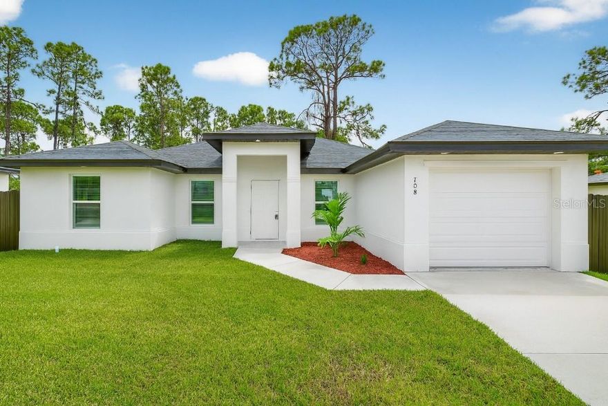This move-in-ready property in Lehigh Acres, Florida, boasts several attractive features:
Impact Windows and Doors: The home is equipped with impact windows and doors throughout, a significant advantage in Florida's climate.
Modern Appliances: It includes stainless steel appliances and a washer and dryer, suggesting a modern and convenient living space.
Spacious Lot: The property sits on a 0.25-acre lot, providing ample space for outdoor living, including a potential patio area. 
Living in Lehigh Acres
Lehigh Acres is known for its affordability and appeal to families seeking a warm-weather lifestyle without the high costs of coastal areas