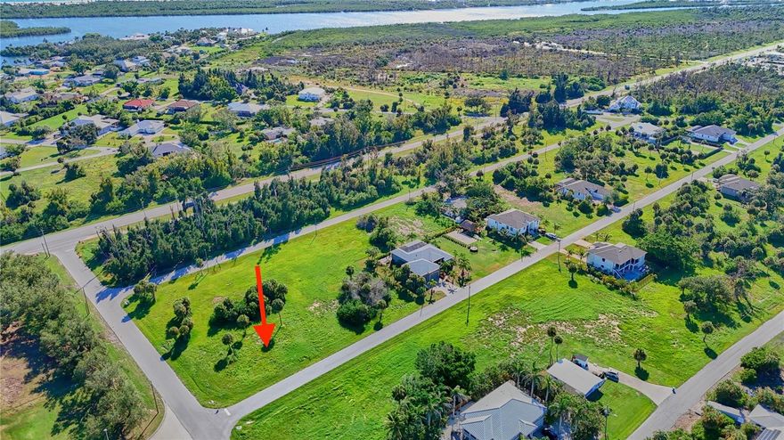 OVERSIZED 180x120 corner lot in the sought-after Cape Haze East community! This CLEARED and surveyed parcel, just under a half acre, is ready for your dream home with public water, sewer, and utilities in place. Enjoy low HOA fees with perks that include a private dock and exclusive beach access on Don Pedro Island—only accessible by boat. With minimal deed restrictions, the neighborhood maintains its beauty while giving you flexibility in home design. Ideally located along Placida Road, you’ll be minutes from Publix, restaurants, marinas, golf courses, and public boat ramps. World-famous Boca Grande is just 2.5 miles away, offering boutique shopping, fine dining, tarpon fishing, and stunning beaches. This property blends convenience, coastal charm, and investment potential—don’t miss it!