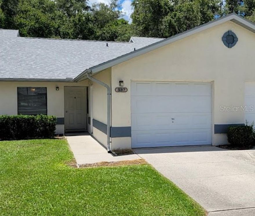 Well-Maintained 2-Bedroom, 2-Bath Villa in Charming Whispering Pines Community of Inverness. Discover the Florida lifestyle living in this beautifully maintained 2-bedroom, 2-bath villa! This inviting home features a convenient eat-in kitchen, a spacious living room, and a screened back patio with attractive tile flooring—perfect for relaxing while enjoying peaceful, naturistic views. The primary ensuite offers a walk-in closet and a step-in shower for added comfort, while the second bedroom is generously sized, providing a welcoming space for guests or a home office. Skylights fill the home with natural light, creating a bright and airy atmosphere. A 1-car garage adds practical storage space, and community amenities include a clubhouse and refreshing pool—ideal for socializing or unwinding on warm Florida days. Enjoy the convenience of being close to shopping, restaurants, medical facilities, beautiful lakes, and scenic parks. Whether you're relaxing on your private patio or taking advantage of the community's features, there's always something to enjoy here. Don't miss out—schedule your private showing today!