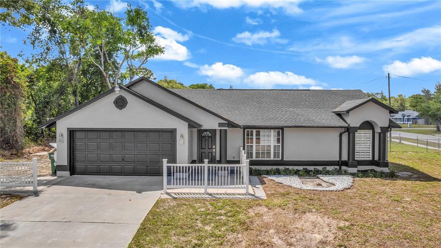 Fully renovated top to bottom with a brand new roof (2026) and move-in ready! This stunning Deltona home features a bright open-concept layout with luxury vinyl flooring, a modern kitchen with new cabinets, stainless steel appliances, and a spacious island perfect for entertaining. Updated bathrooms showcase sleek, contemporary finishes, while the large backyard offers plenty of room to relax or host gatherings. Major upgrades provide peace of mind, and the location offers easy access to shopping, dining, and main roads. Don’t miss this one!