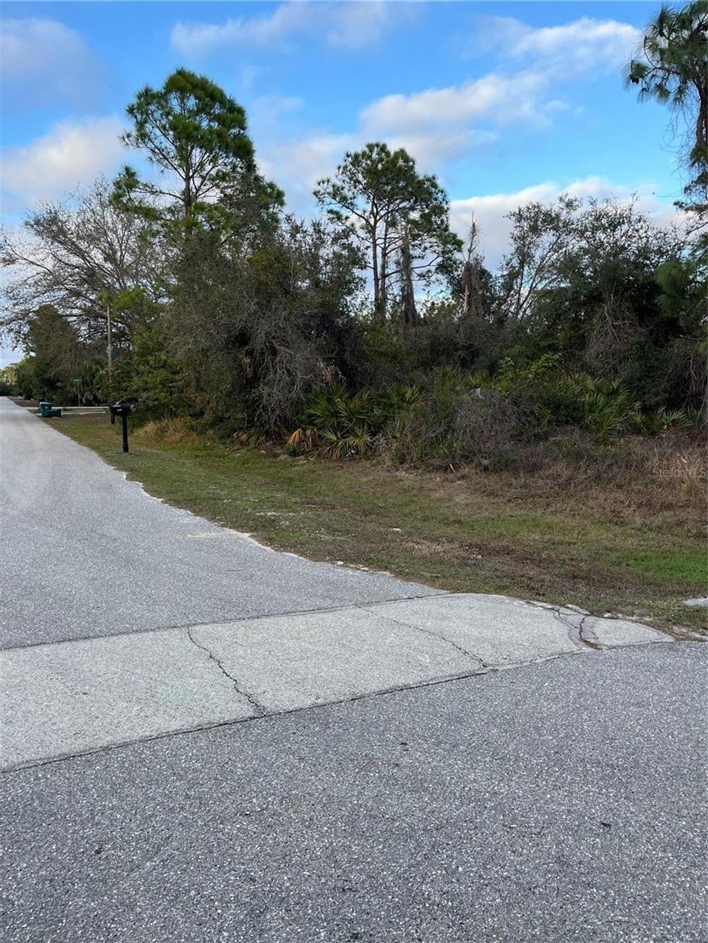 Photo of 18320 Poston Avenue, Port Charlotte, FL 33948 (MLS # C7519974)