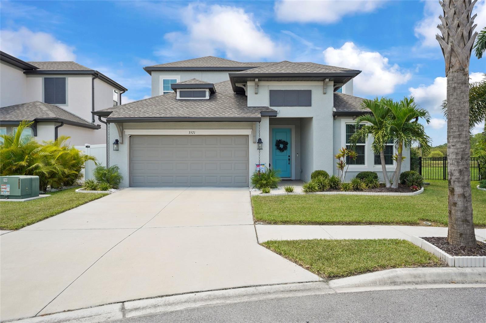 Experience modern living in this 2023-built Calusa model by M/I Homes, offering 4 bedrooms, 4 bathrooms, an office, and an upstairs loft. Thoughtful upgrades, timeless finishes, and a functional layout make this residence truly stand out. At the heart of the home, the open-concept kitchen showcases a large center island, quartz countertops, stainless steel appliances, and upgraded cabinetry, flowing seamlessly into the great room, dining area, and outdoor living space. Wood-look tile extends throughout the main living areas, including the office and primary suite, offering both durability and modern style. Since purchasing, the owners have enhanced the property with a heated saltwater pool and spa, fencing, mature landscaping, gutters, and a French drain in the backyard. Additional upgrades include impact windows and sliders throughout, added insulation in both the attic and garage door, a custom primary bedroom closet, upper cabinets in the laundry room, and a newly replaced dishwasher (2025). Abundant storage throughout the home ensures everyday convenience. The first floor offers 3 bedrooms, 3 bathrooms, and a private office, while the upstairs includes the loft along with an additional bedroom and full bathroom. Every bedroom in the home features its own en suite bathroom, providing comfort and privacy for family and guests. The primary suite offers a spa-like retreat with dual vanities, glass-enclosed shower, and a custom closet. Situated on a preserve and pond view homesite, this property offers open views and the privacy of no rear neighbors. Hidden Creek residents benefit from NO CDD fees, LOWER HOA dues, and a convenient location just minutes from Waterside Place, Lakewood Ranch, UTC, and Sarasota’s Gulf Coast beaches. Call to schedule your private showing today!
