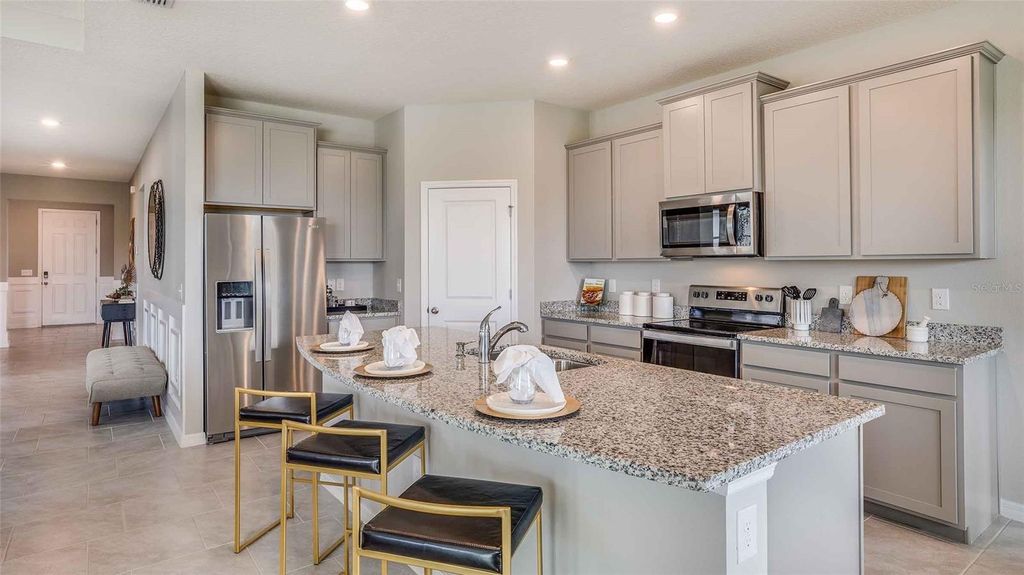 Photo of 2221 Sienna Spruce Street, Wesley Chapel, FL 33543 (MLS # TB8432959)