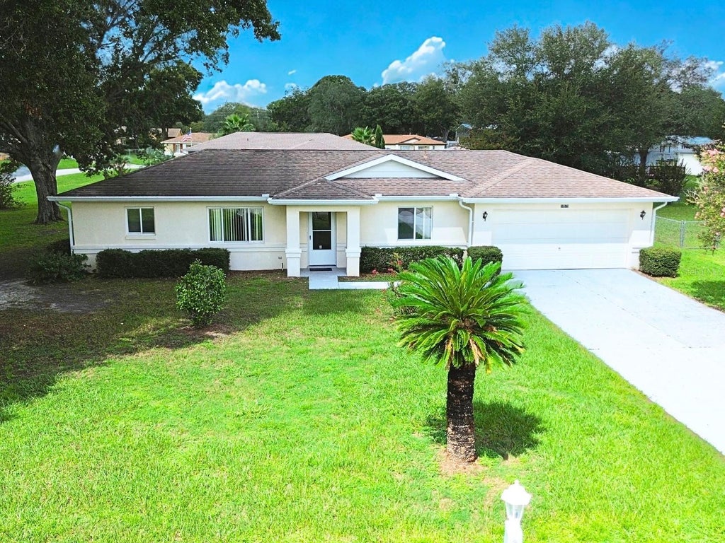 Photo of 10579 SW 62nd Terrace Road, Ocala, FL 34476 (MLS # OM731600)