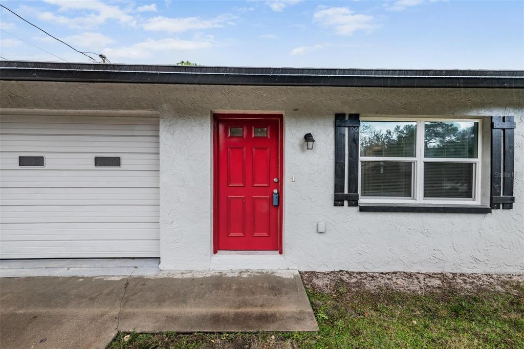 Photo of 7802 Butler Avenue, Hudson, FL 34667 (MLS # TB8453638)