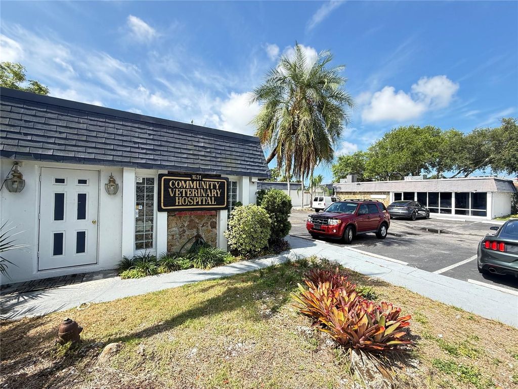 Photo of 1631 W Bay Drive, Largo, FL 33770 (MLS # TB8509646)