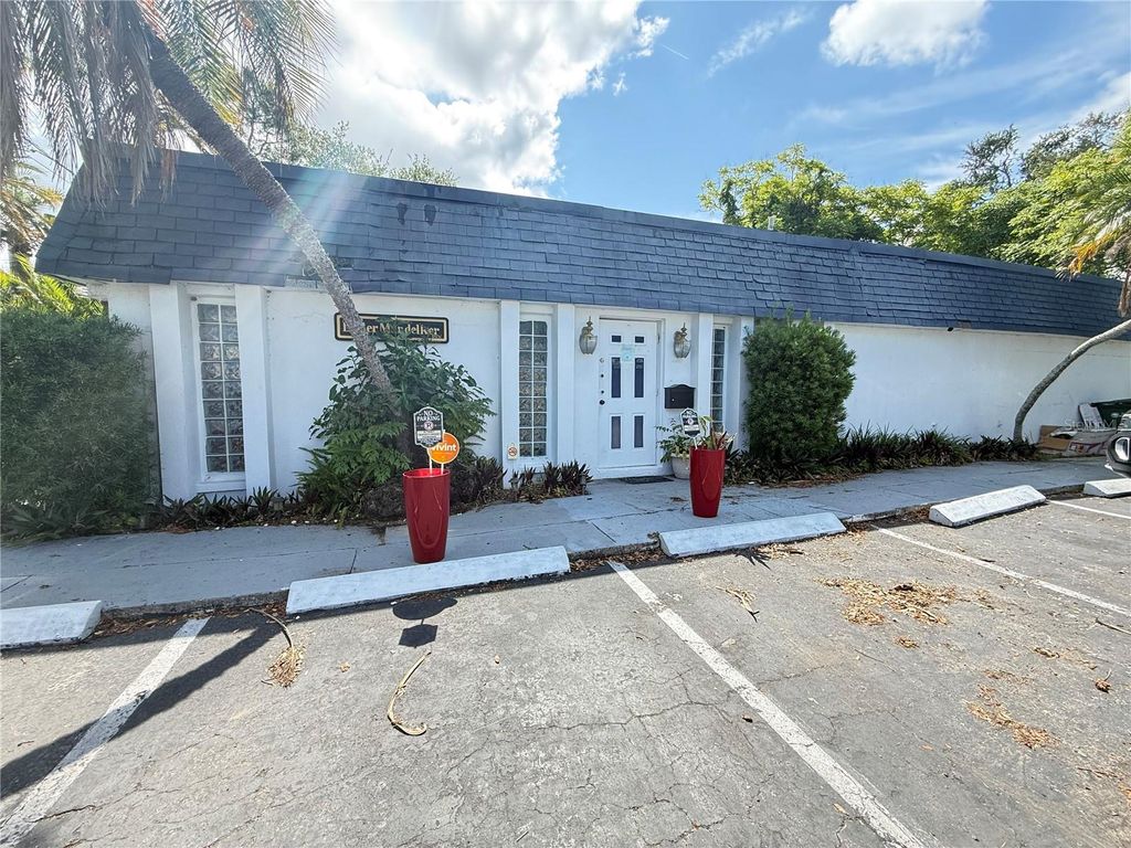 Photo of 1631 W Bay Drive, Largo, FL 33770 (MLS # TB8509646)