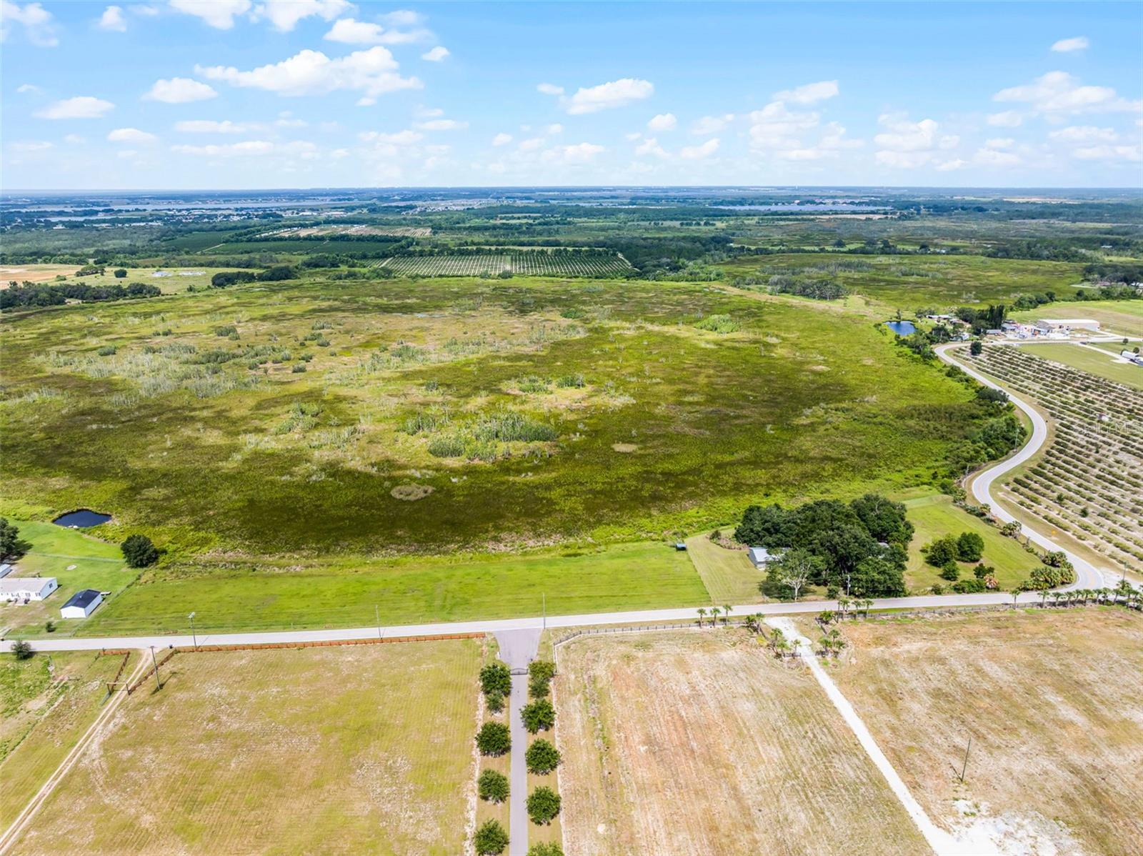 Discover the perfect blend of space, privacy, and potential with this rare 32+ acre parcel located just west of serene Lake Lowery. Whether you’re seeking a peaceful homestead, investment hold, or future development, this expansive property offers the flexibility and canvas to bring your vision to life. Massive 1.4+ million sq ft lot, Mix of residential and lowland/agricultural use. Includes a 1,248 sq ft manufactured home (built 1981) ( bonus) that can be torn down, and outbuildings (detached garage, patio, and screened room).