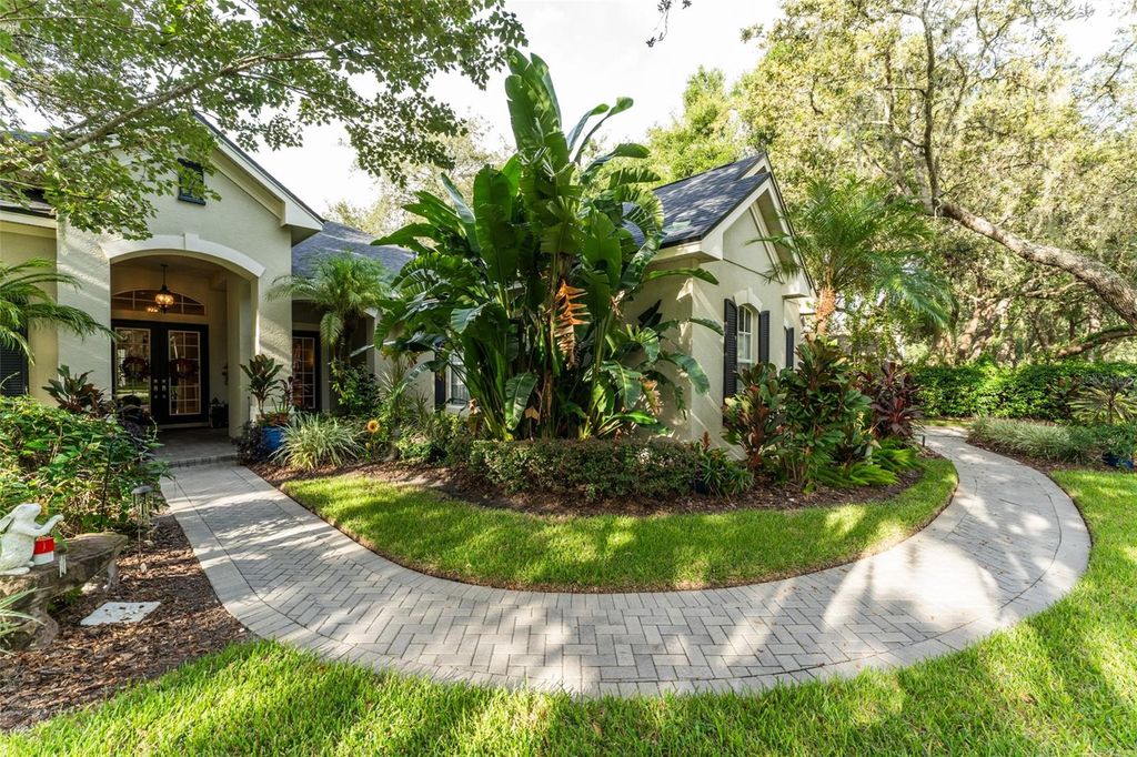 Photo of 17814 Mission Oak Drive, Lithia, FL 33547 (MLS # TB8424450)