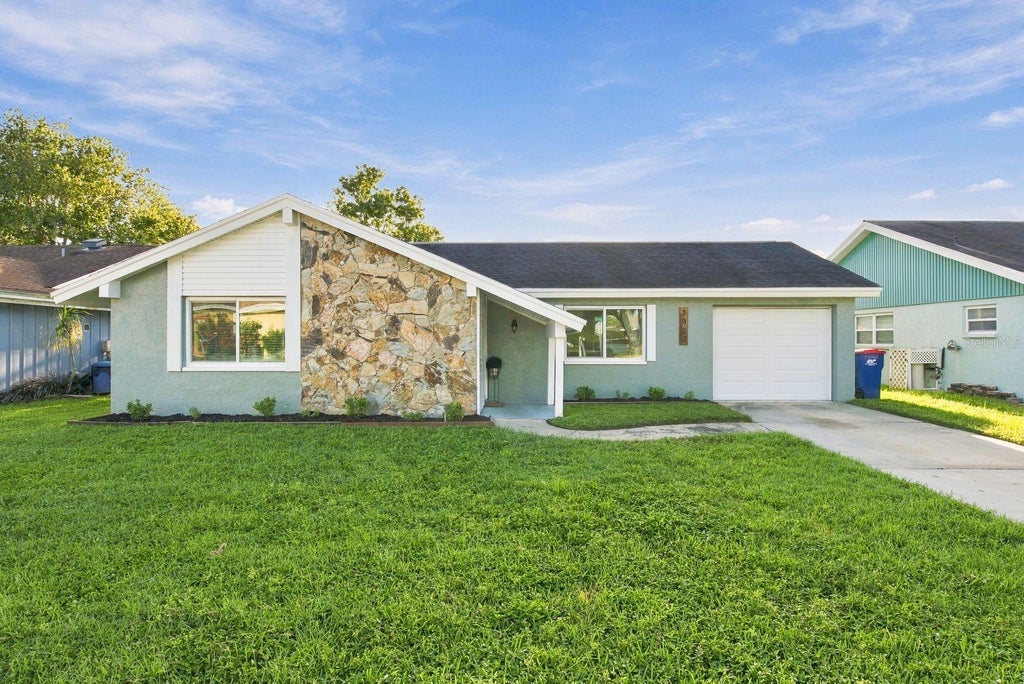 Photo of 3920 Edgemont Drive, New Port Richey, FL 34652 (MLS # TB8548258)