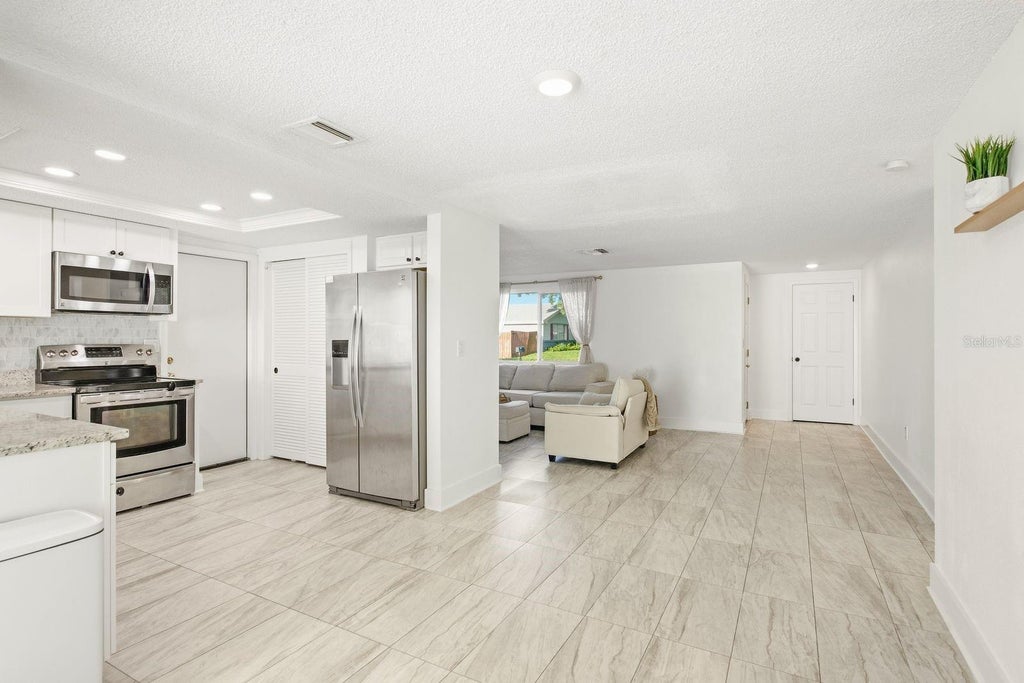 Photo of 3920 Edgemont Drive, New Port Richey, FL 34652 (MLS # TB8548258)