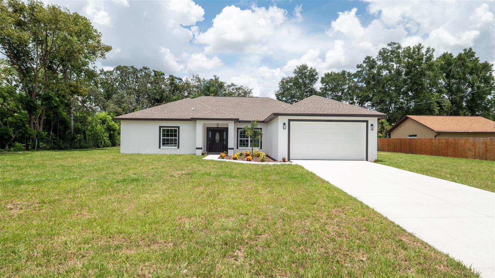 Welcome to your dream home in the charming community of Spring Hill, FL! This stunning single family home boasts 4 spacious bedrooms and 2 luxurious bathrooms, perfect for accommodating your family and guests. With 2125 square feet of living space, there is plenty of room to entertain and relax. The attached 2 car garage provides ample storage space for all your vehicles and outdoor equipment. As you step inside, you will be greeted by an open and airy floor plan, featuring high ceilings and large windows that flood the home with natural light. The kitchen is a chef's delight, equipped with modern appliances and plenty of counter space for meal preparation. Enjoy the Florida sunshine in the backyard, which offers a serene and private setting. Don't miss out on the opportunity to make this beautiful property your new home. Schedule a showing today!