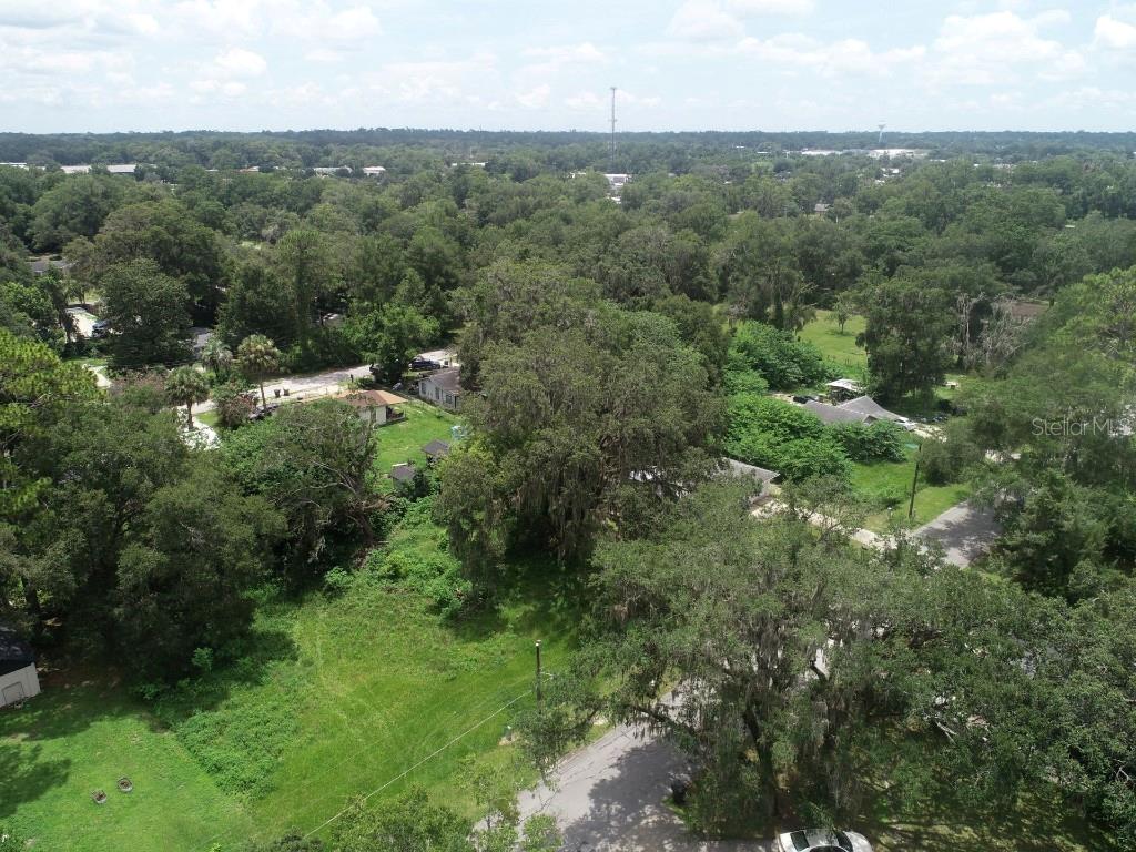 Build your dream home with access from NW 3rd Ave in an R-1A Single Residential zone—no HOA or deed restrictions! City water, sewer, and nearby electricity make building easy. Enjoy Ocala’s parks, golf, museums, hiking trails, and Lake Weir’s beaches just minutes away.
Explore the Ocala National Forest with camping, lakes, and trails close by. Only 1 hour to Bird Creek Beach on the Gulf of Mexico. Surrounded by vibrant cities yet steps from nature’s beauty—this is the perfect blend of convenience and tranquility!