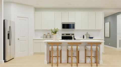 Tiny photo for 913 Tundra Loop, Groveland, FL 34736 (MLS # O6369675)